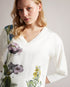 RAILI-Knitwear-Luxury and loungewear collide in the RAILI jumper. Featuring a relaxed fit in a breathable cotton and linen blend, the true standout of this piece is the floral satin front. Perfect for a day out with friends or a casual date, it offers both comfort and style. Jumper Botanical bouquet print Satin front Cotton and linen blend V-neck 3/4 length sleeves Round hem Jara is 5'10.5" / 1.79cm and wears White in a Ted size 1- Ted Baker Romania